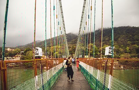 An European tourist at Ram Jhula Bridge 
